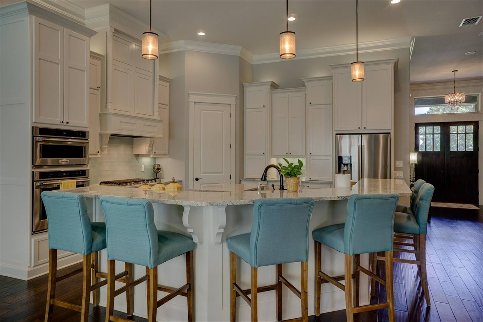 Open, modern kitchen interior with connected living space
